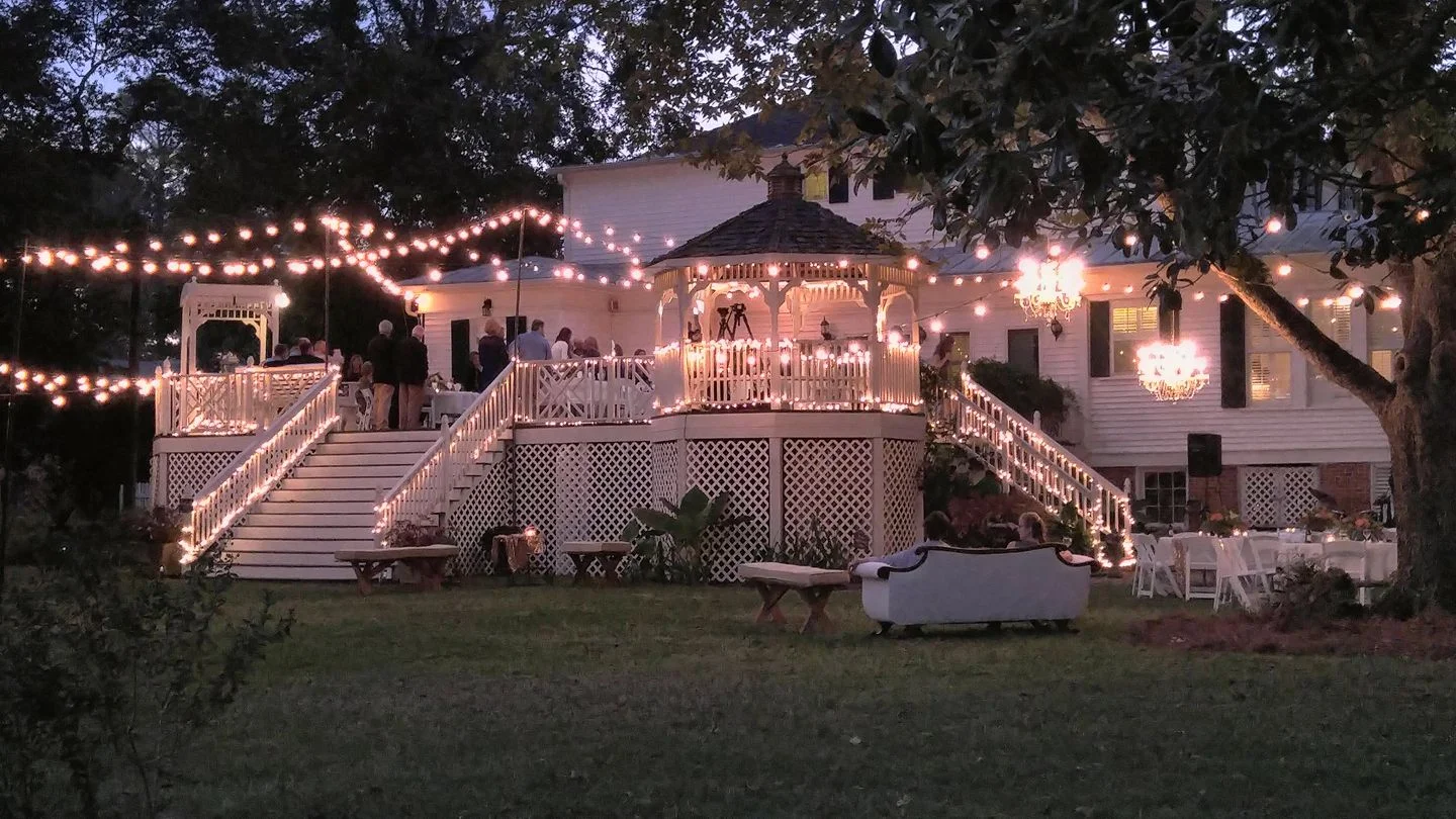 backyard up in lights at the grand magnolia house.jpg