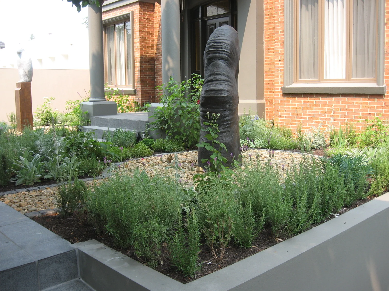 Planting, walls, gravel, art. Toorak