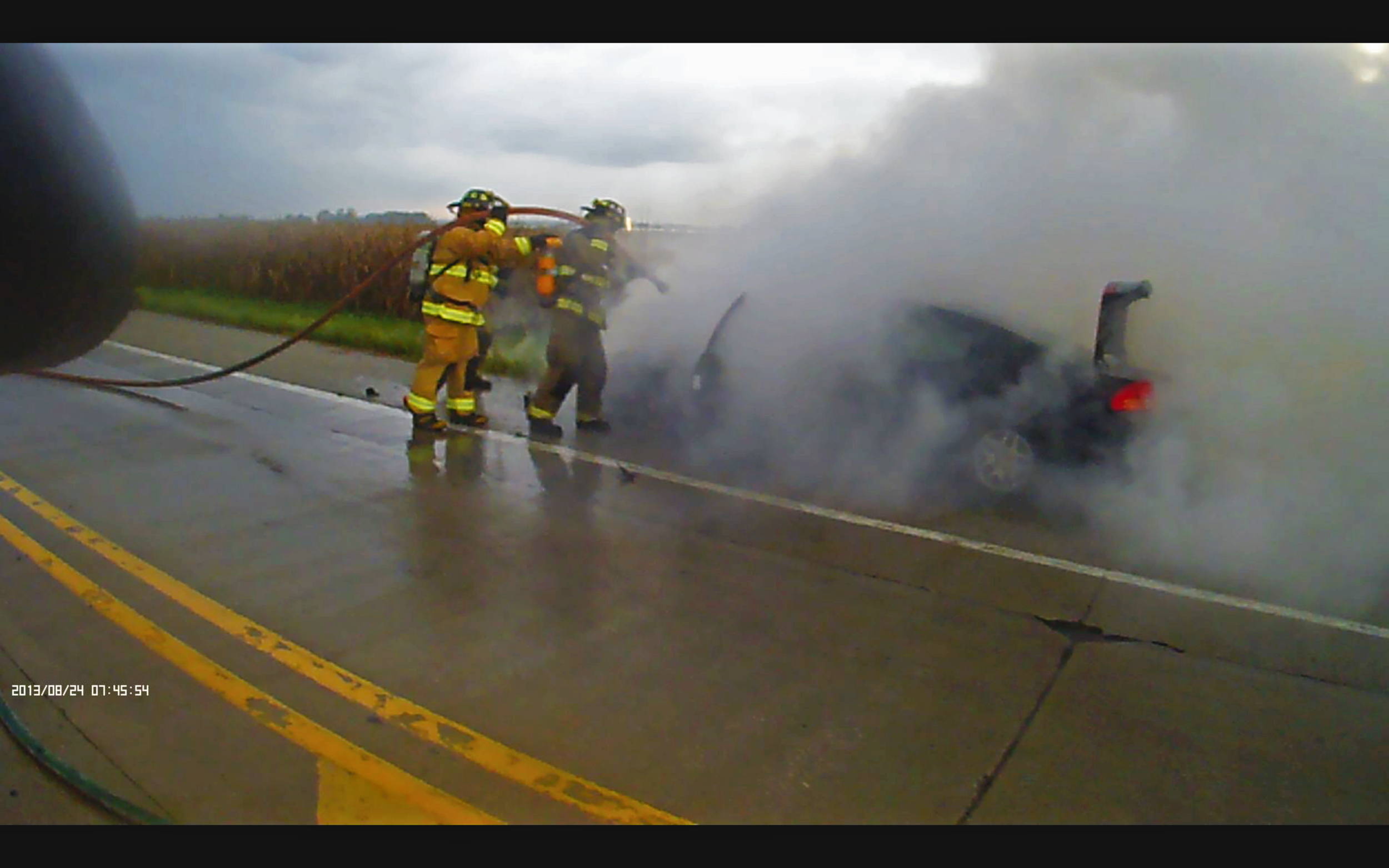  On 9 September 2016, ESFD responded to a vehicle fire on S. Green Mount Rd. Pictured are Firefighters Stock and Chavaree extinguishing the fire. 