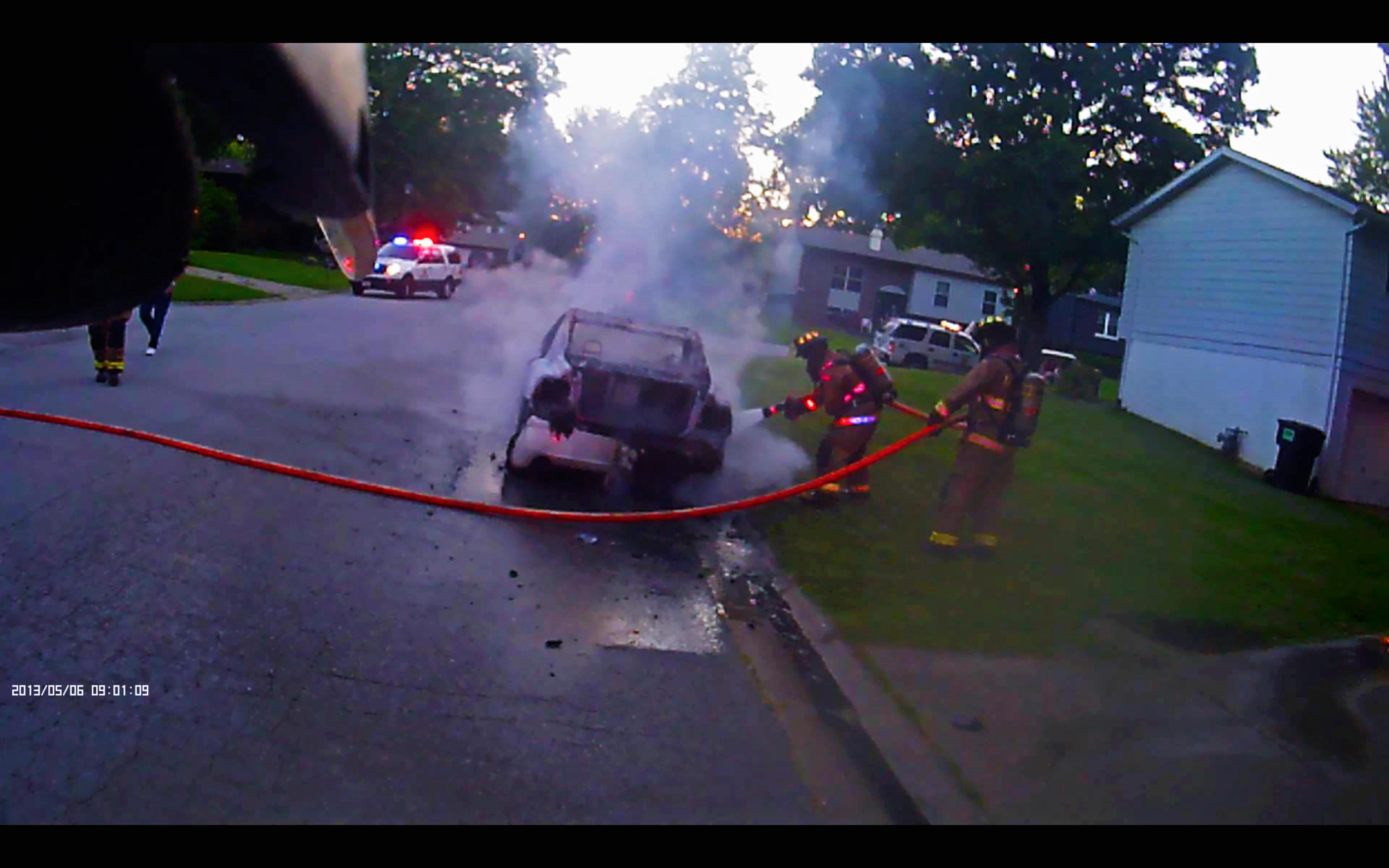  On 22 May 2016, ESFD responded to a report of a fully involved vehicle fire near Las Olas Drive. Pictured is Firefighters Lombardo and Malak extinguishing the fire. 