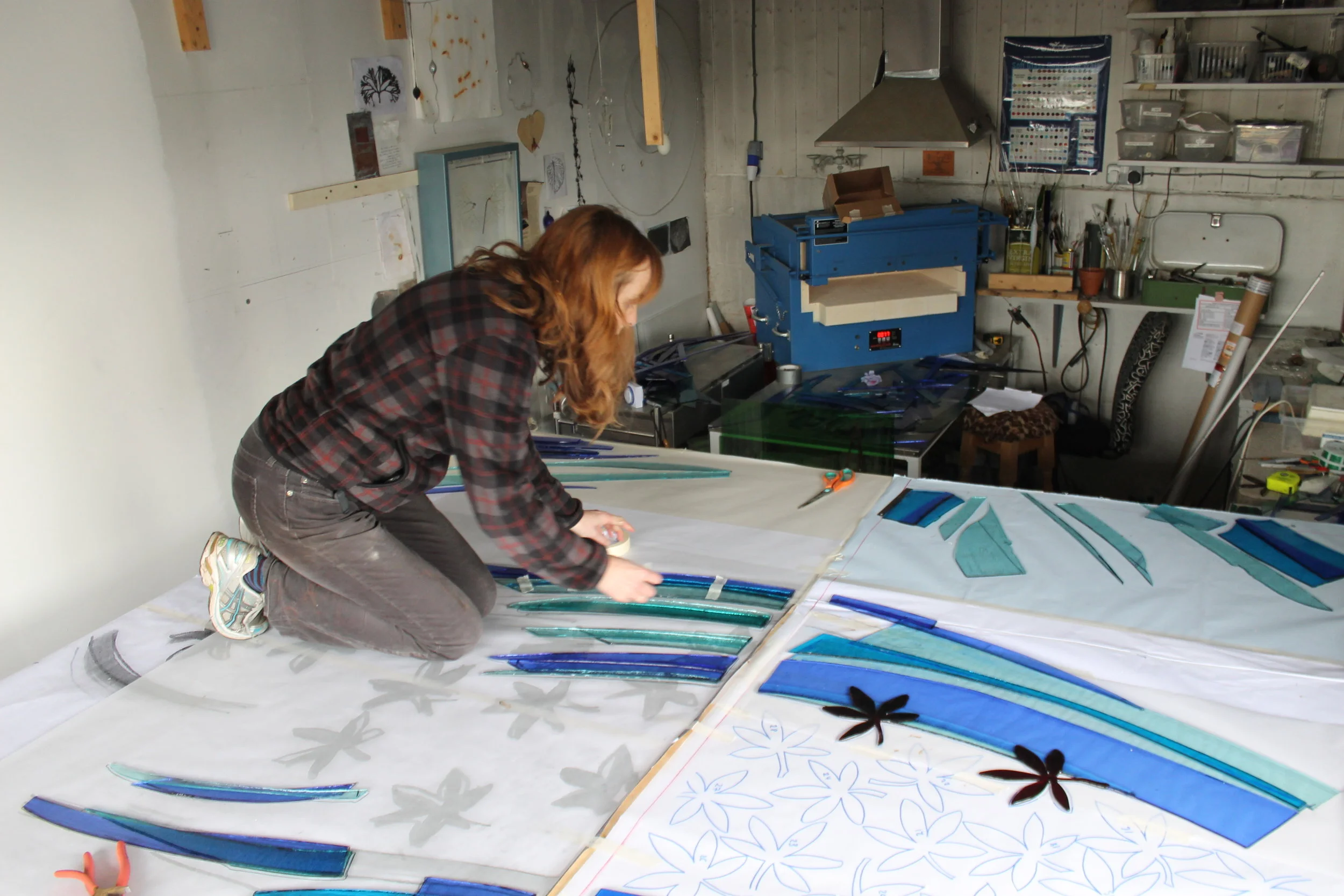 There are different approaches to executing large scale work. Producing a design which can be handed off to a studio for fabrication is one, my approach is to make as much of the work myself as possible and in my own studio. This allows me to continue to make creative decisions in response to the fabrication process and retain in the work the feel of something that has been produced by hand. The techniques I use focus on the unique properties of glass, and maximise the potential for refraction. Through heat manipulation and applying abrasive techniques to the surfaces of the glass I like to exploit the unique characteristics inherent in the material and endeavour to create innovative applications. 