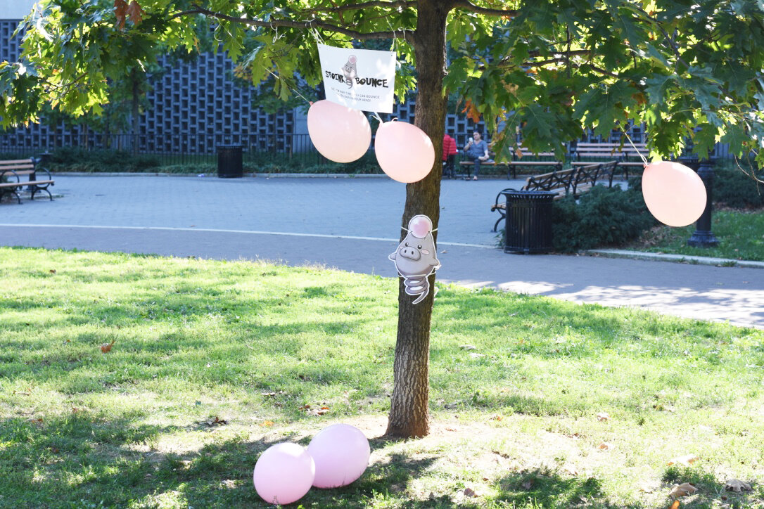  Kids had to see how many times they can stomp up on the pink balloons. It was meant to be on the ground but the wind was too strong so I hung them from the tree branches. 