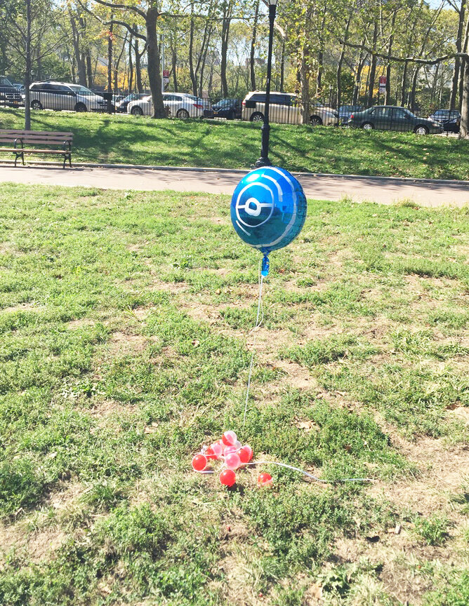  Hand painted blue mylar balloons to mimic the poke stops. Kids had to collect empty containers to keep their mini pokemons they will catch during a game. 