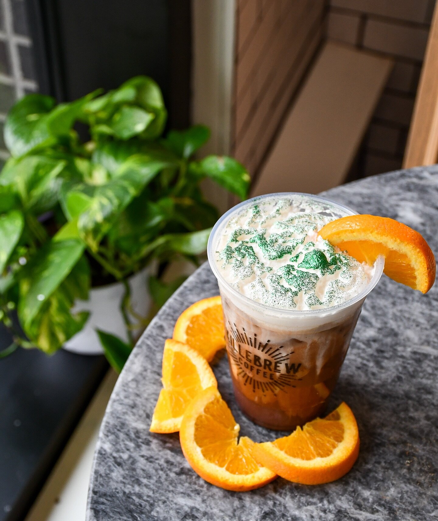 St. Paddy&rsquo;s day weekend calls for coffeeee! 🍀 Try the Ides of March, our seasonal orange mocha special. Topped with cold foam &amp; green glitter to get a little festive!