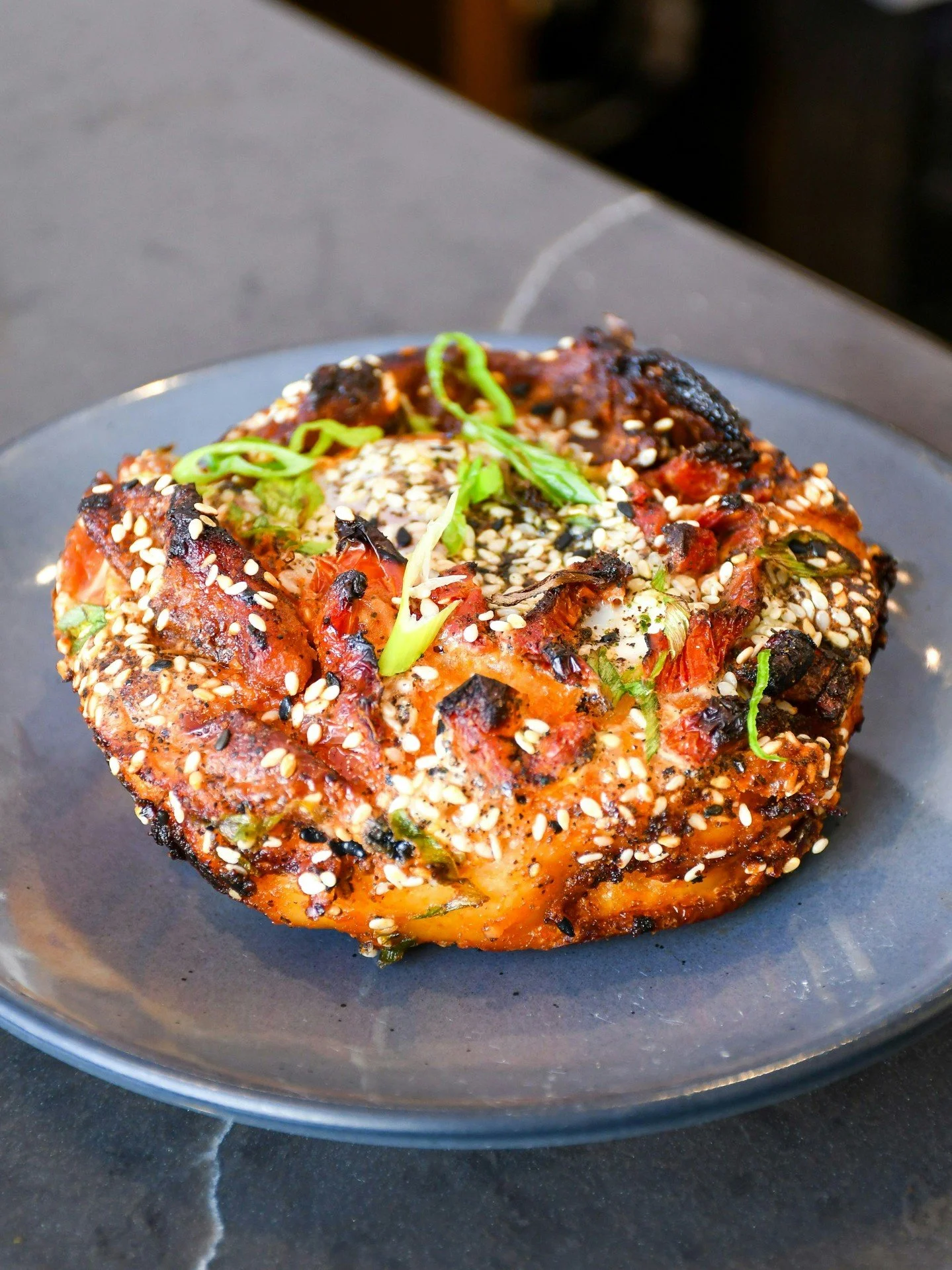 Your breakfast just got a little spicier. 🔥🍳 

Meet the Gochujang Breakfast Focaccia made with sun dried tomato, potato, egg, and topped with furikake.
.
.
.
#killebrew #coffeeshop #thegulch #nashvillecoffee #nashvillecoffeeshop #nashvillefoodie #e