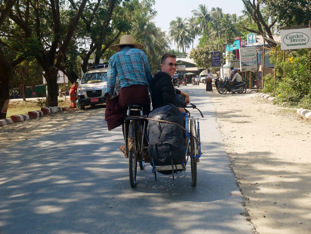  After the long bus ride, we were surrounded by men offering trishaw rides from the bus stop to our hotel - why not? 