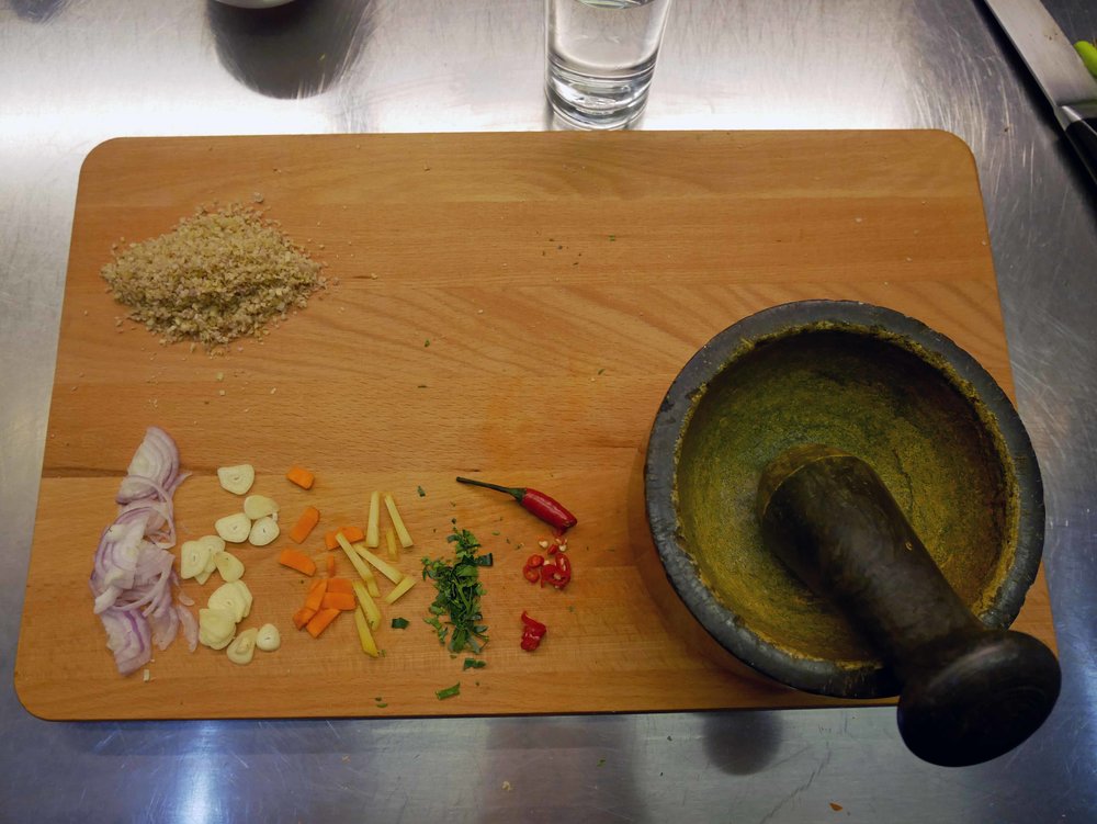  Ingredients, including shallot, ginger, tumeric, red chili and chopped lemongrass that we'd smash into the curry paste for our traditional Amok (March 10).&nbsp; 