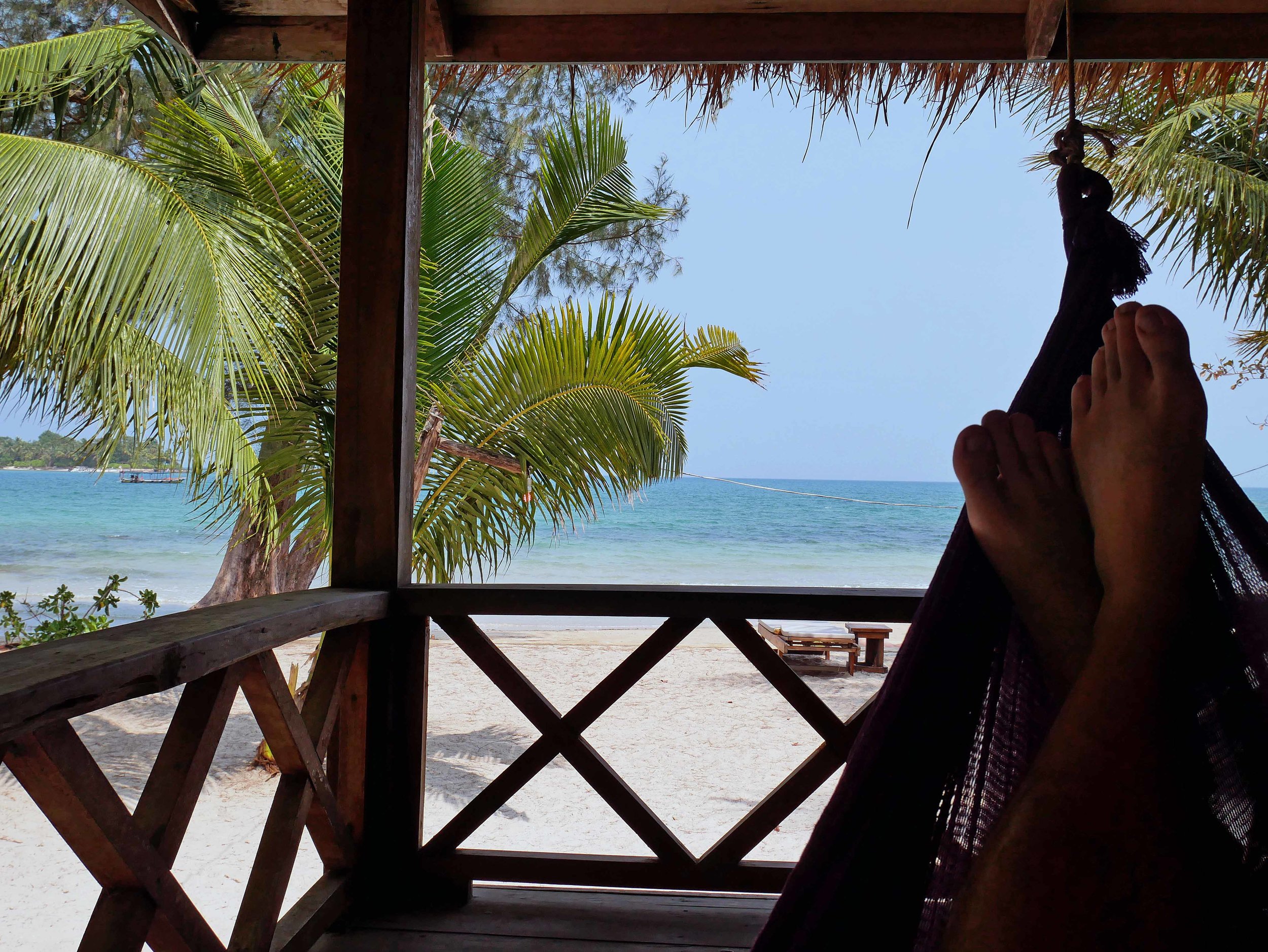  Lazy days spent with feet up and book in hand on the porch of our bungalow (March 3). 