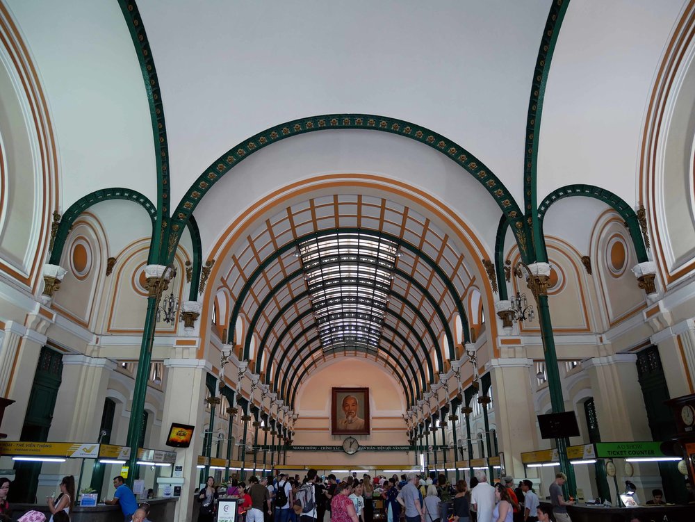  The interior of the Post Office features high arched ceilings and a portrait of former revolutionary leader Ho Chi Minh.&nbsp; 