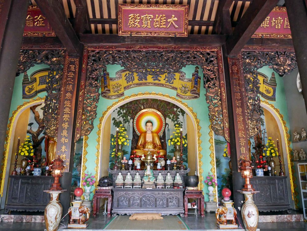  The bright, colorful interior of one of the pagodas dotting Marble Mountain. 