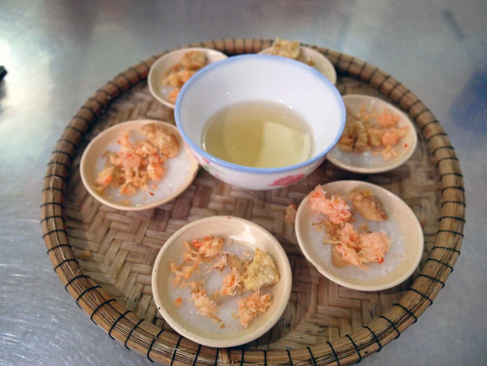  When we arrived in Hue, we once again searched for local treats, finding these  Banh Beo , small rice cakes with shrimp, at Hanh restaurant. 