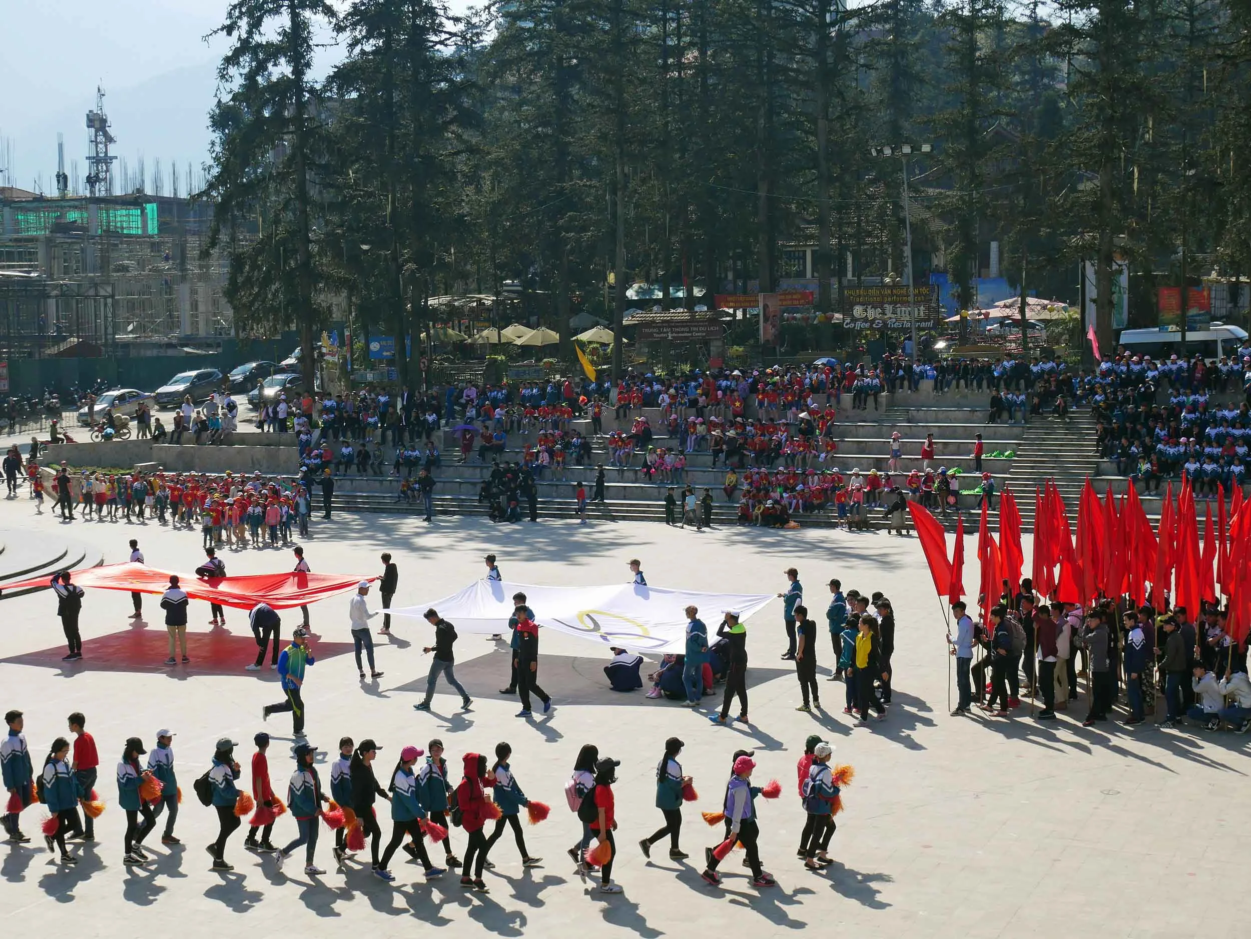 Olympic honorary flag procession ceremony of Vietnamese youth in Sapa town square (interestingly this was one of two Olympic ceremonies we witnessed while in Vietnam - last year Vietnam one its first gold medal -ever- in Rio!) (Mar 22).