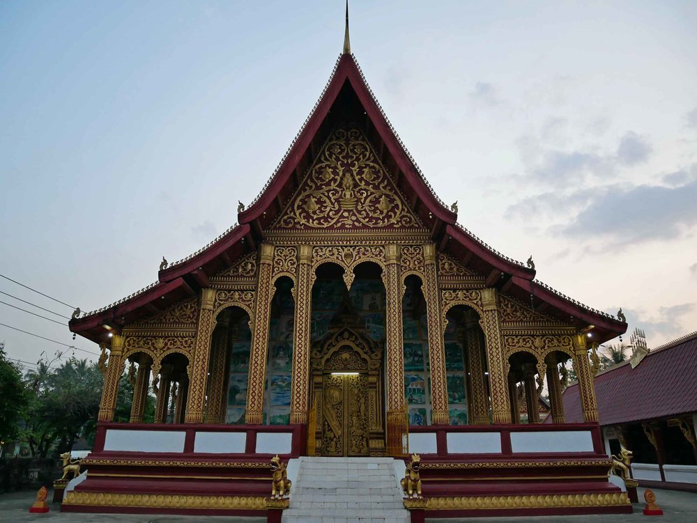  As we walked to dinner on our first night in Luang Prabang, we stumbled upon Wat Manorom, a small monestary where monks were settling in for the evening (April 3). 