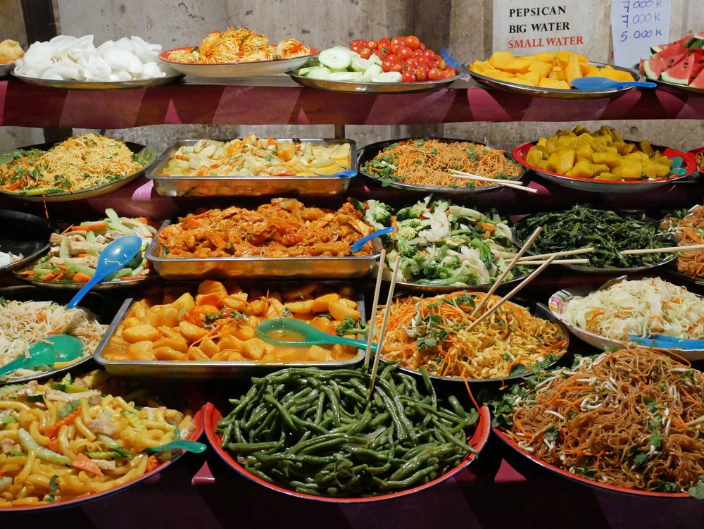  For less than $2 USD, market visitors could fill their plates with heaps of local food, served hot or cold.&nbsp; 