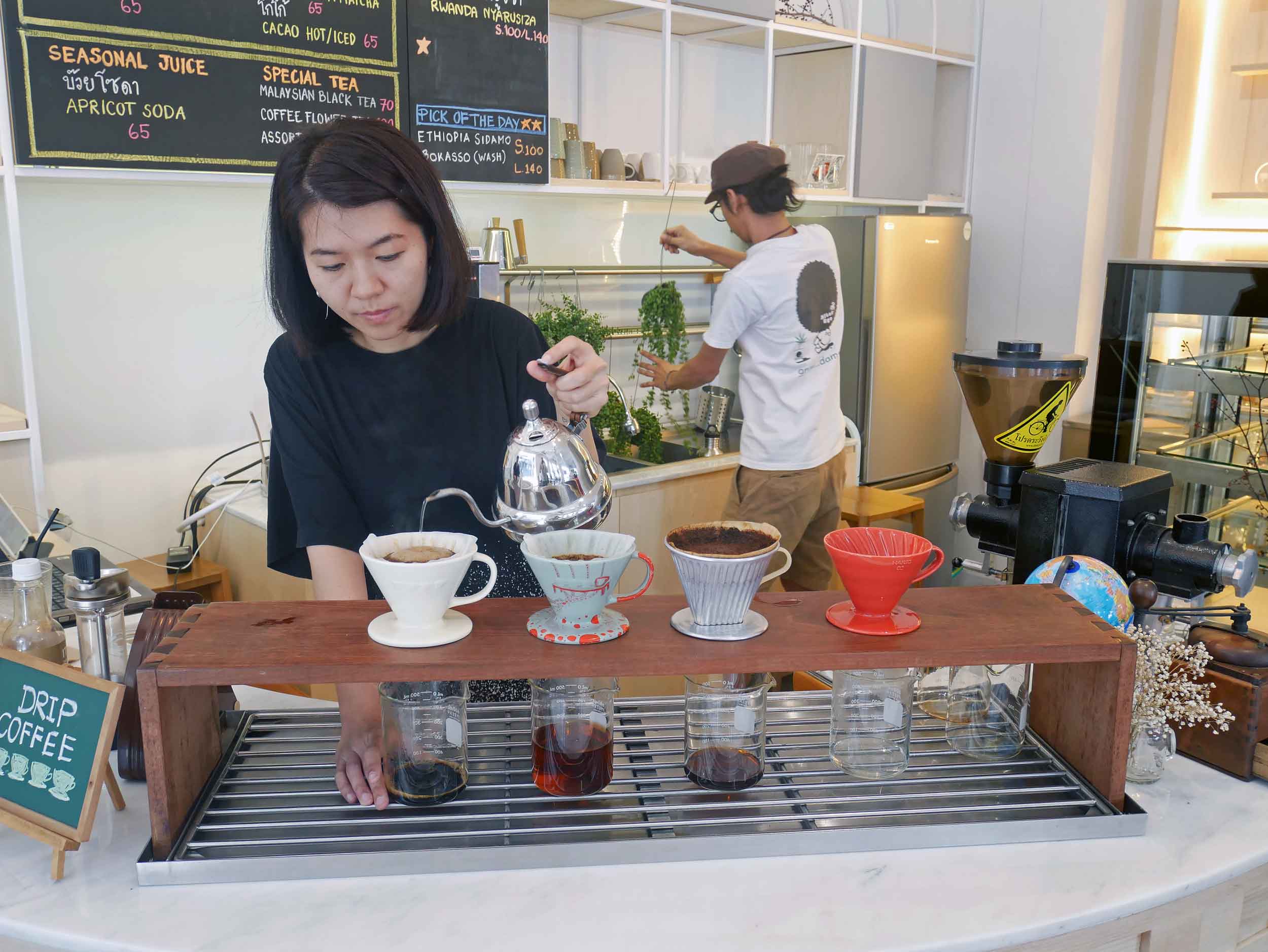 Our lovely barista carefully and beautifully preparing our cold brew coffees at Bangkok's Gallery Drip. 