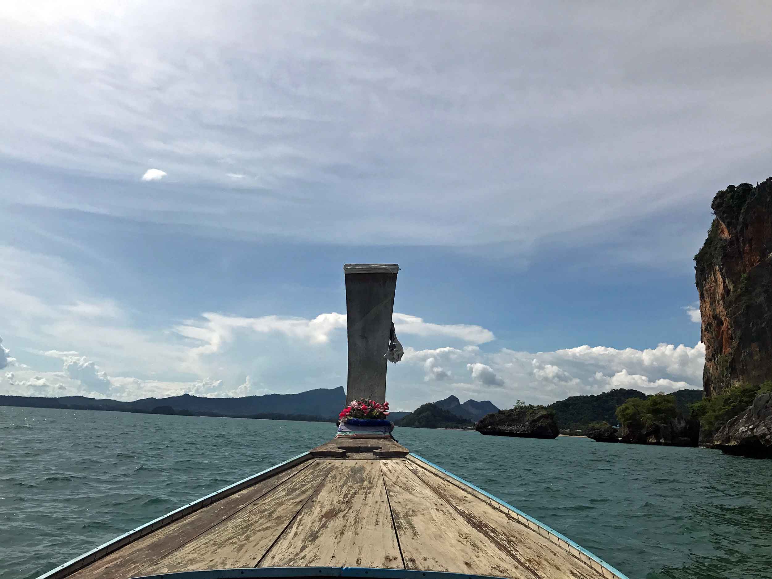  Our short journey to Railay Beach from Ao Nang, Krabi, passed towering limestone karsts that dot the shoreline.&nbsp; 