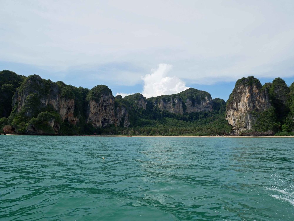  The passing scenery as we make our way to Railay Beach, which is surrounded by towering rock formations.&nbsp; 