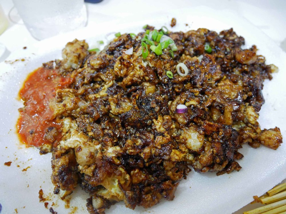  Our favorite discovery here was the black carrot cake, a savory side dish made of daikon, egg and radish.&nbsp; 
