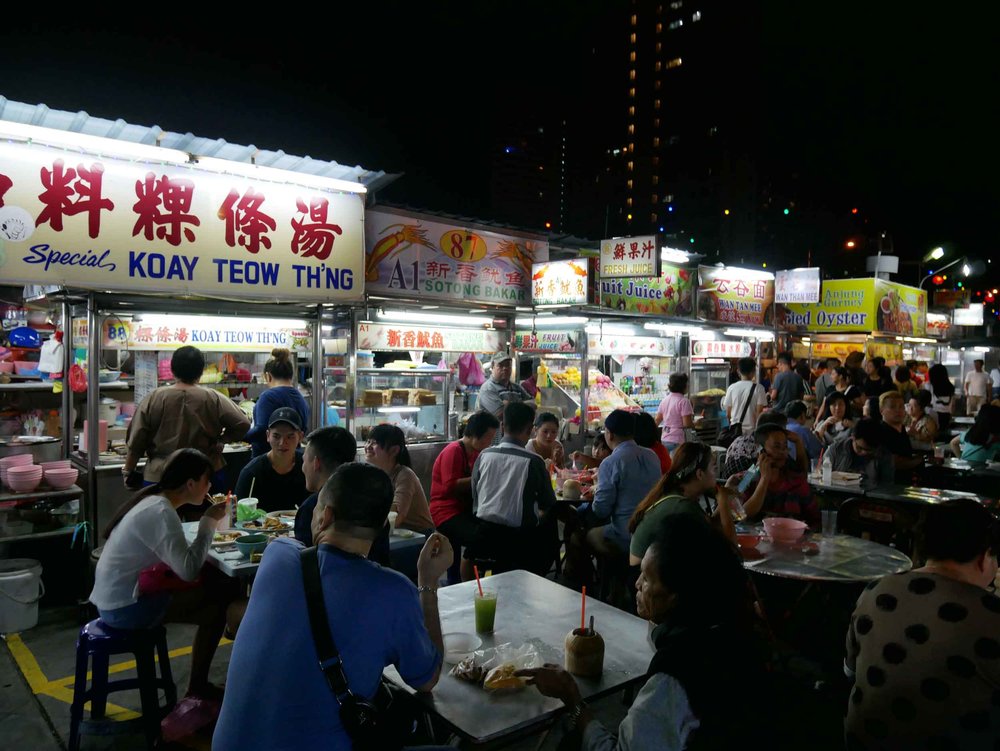  Another famous (and busy) local street food area is Gurney Drive Hawker Stalls, where we waited in a line for about 20 minutes for their  kway teow .&nbsp; 