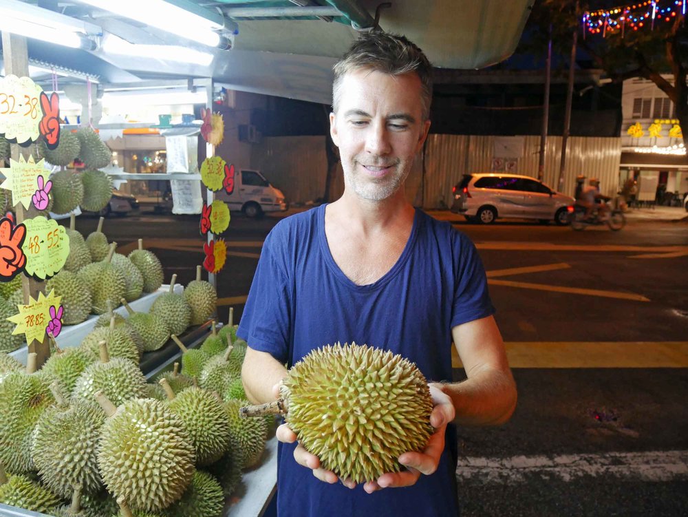  At last, we dared ourselves to try the controversial durian fruit at a stand near our hotel. 