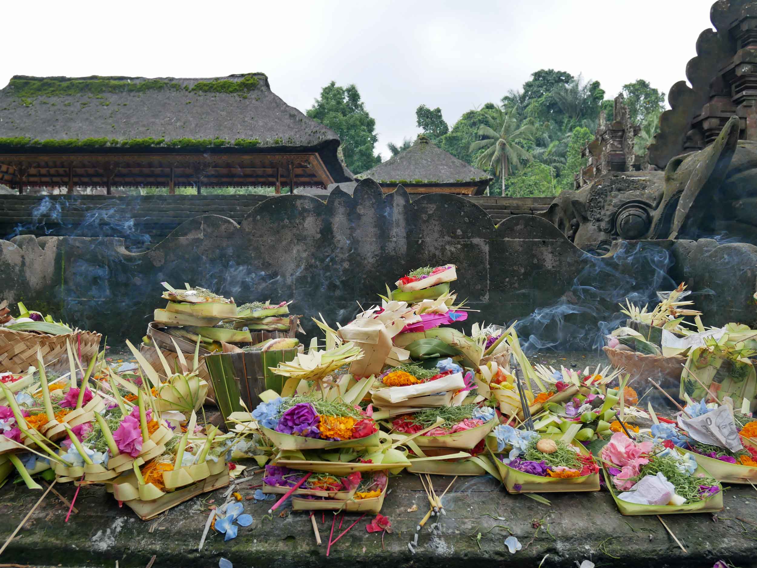  Many offerings, or  canang saris , had been left at the feet of various shrines throughout the temple.&nbsp; 