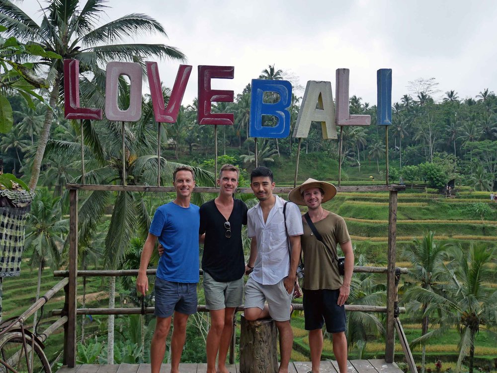  Finally, we (Martin, Trey, Nik and David) arrived to the famous Tegallalang rice terraces that beautifully slope down the verdant valley. 