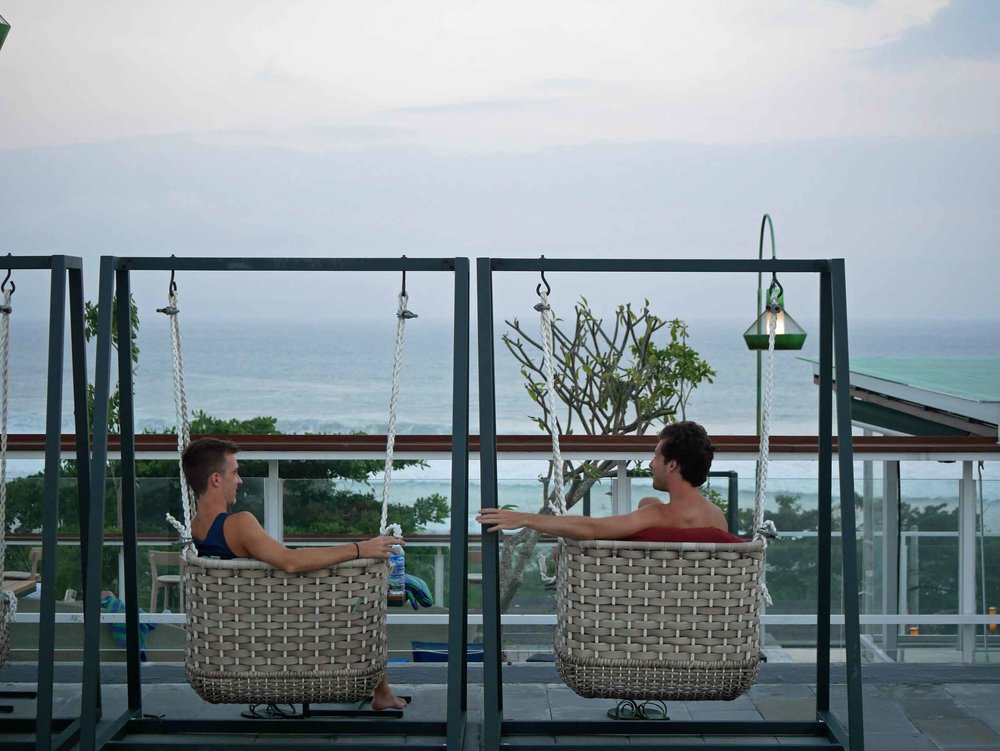  Trey and David caught up on the rooftop of our hotel as the sun began to slide below the horizon in Canggu (June 4).&nbsp; 