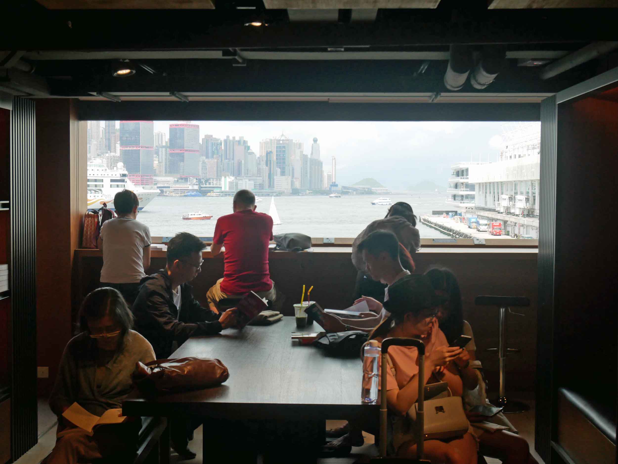 Throughout the multi-level bookstore, there are many places to sit and enjoy a book or periodical with commanding views of Hong Kong Island. 