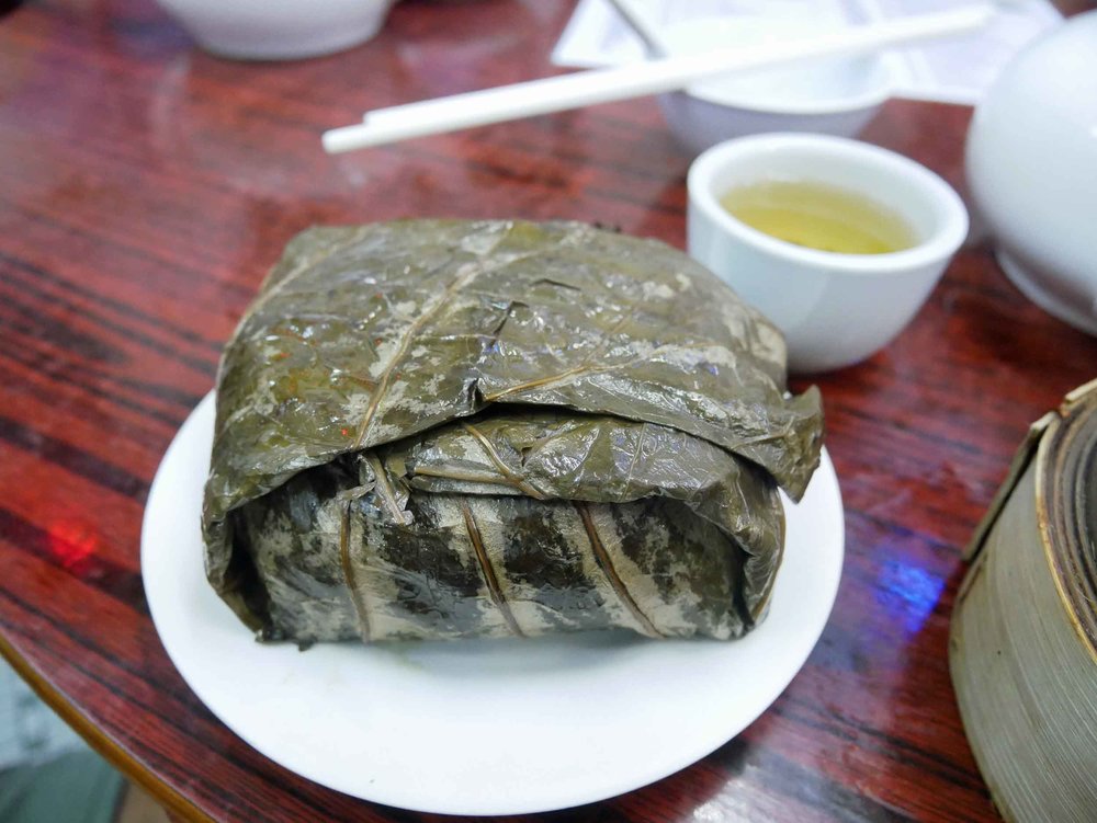  We also enjoyed the traditional  lo mai gai , which comes wrapped up in steamed lotus leaves.&nbsp; 