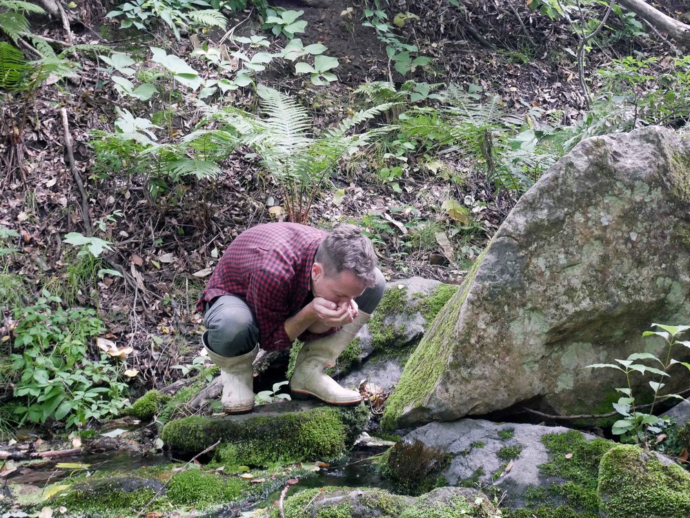  The water on the farm comes from a beautiful natural cold spring. Here, Martin has a taste straight from the source. 