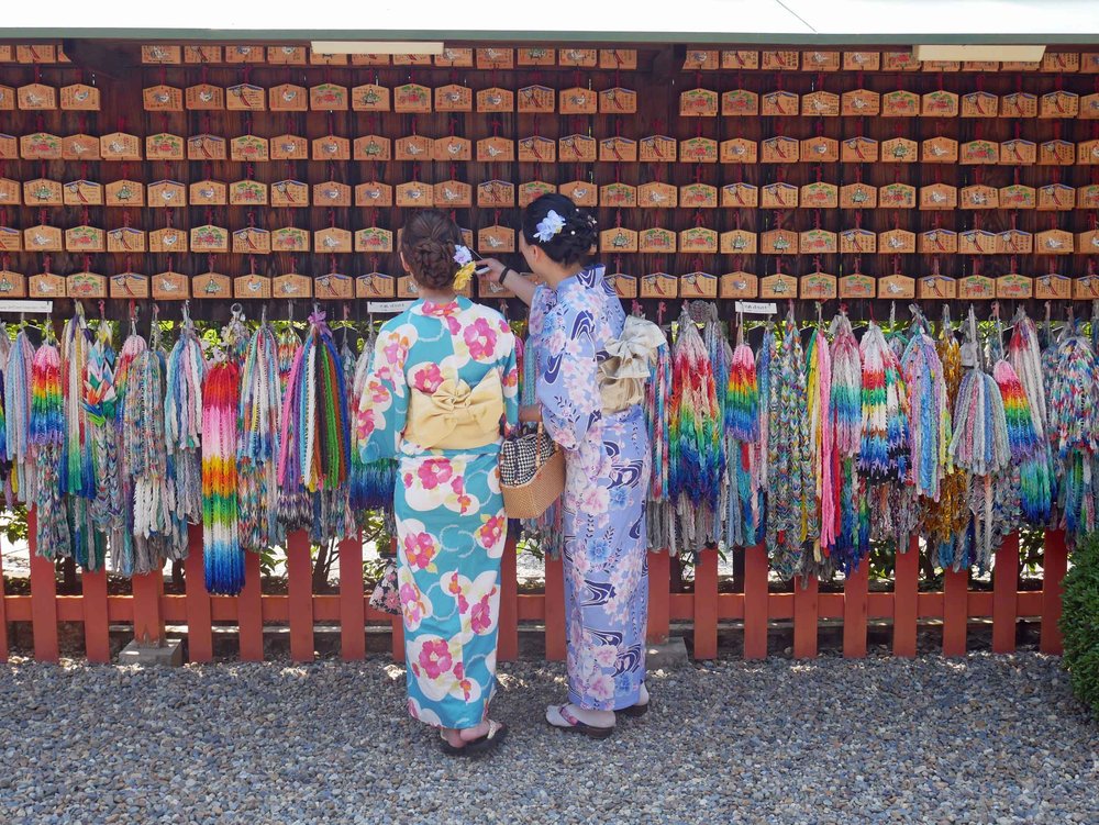  Many visitors were dressed in national costume as they took photos and made offerings around the complex.&nbsp; 