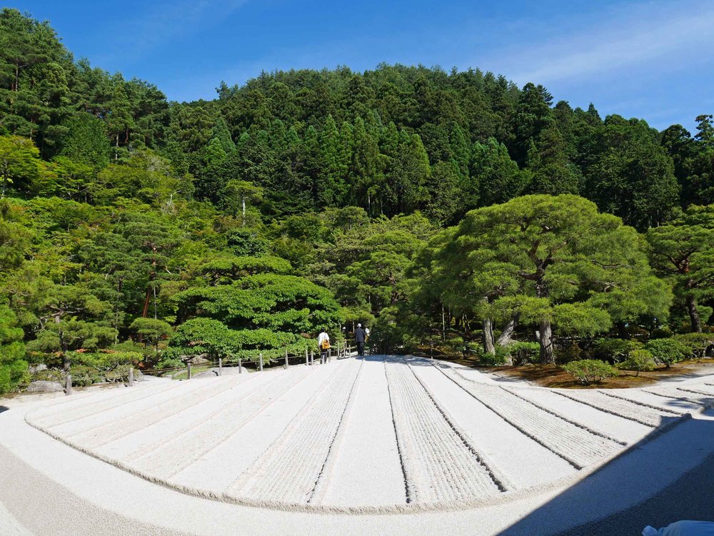  The Japanese rock garden, or dry landscape garden,&nbsp;often called a zen garden,&nbsp;creates a miniature stylized landscape through carefully composed arrangements of rocks, water features, moss, pruned trees and bushes, and uses gravel or sand t
