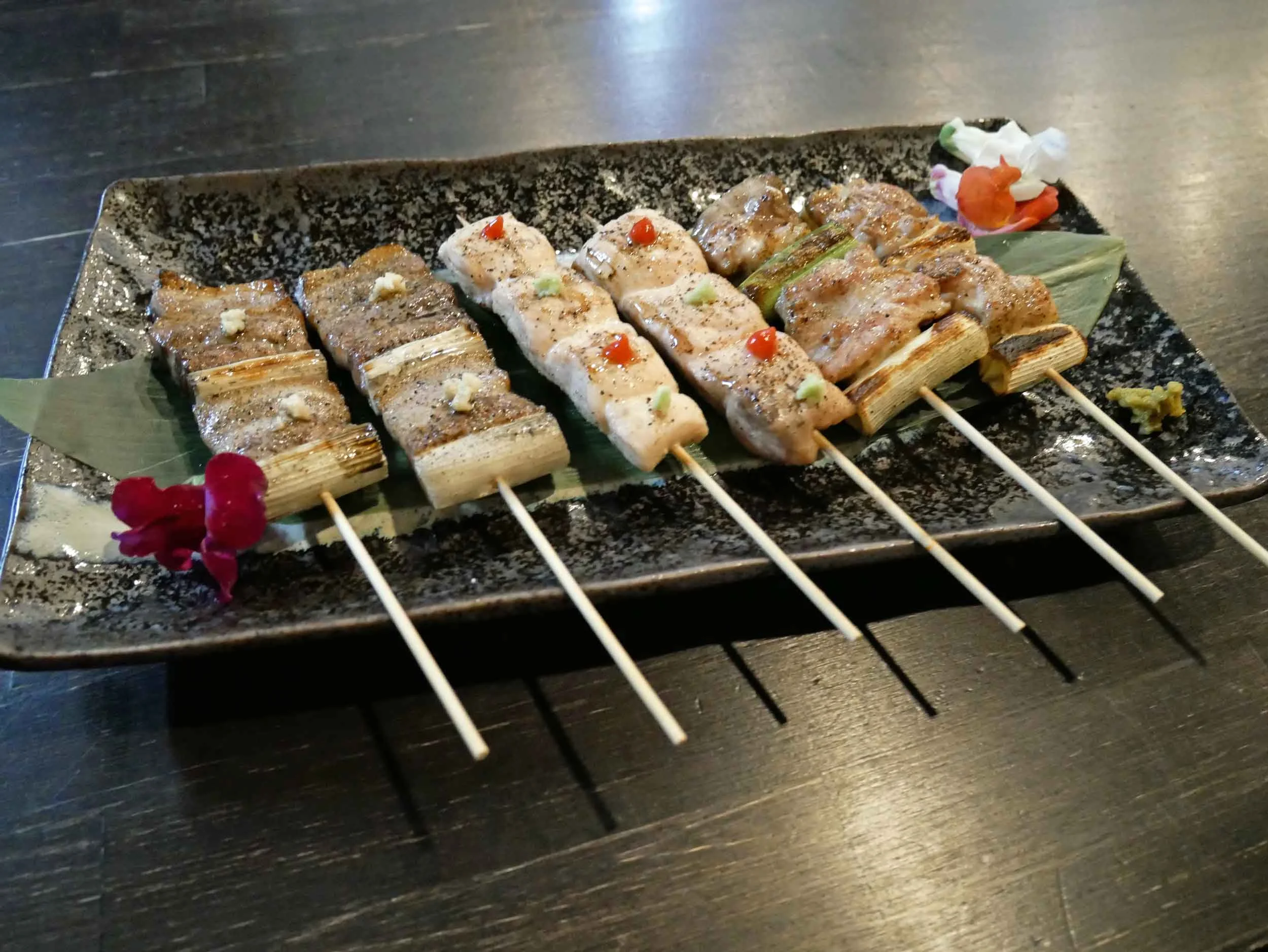  A delicious dinner at Elbow Room; chicken yakitori, pork belly skewers. 