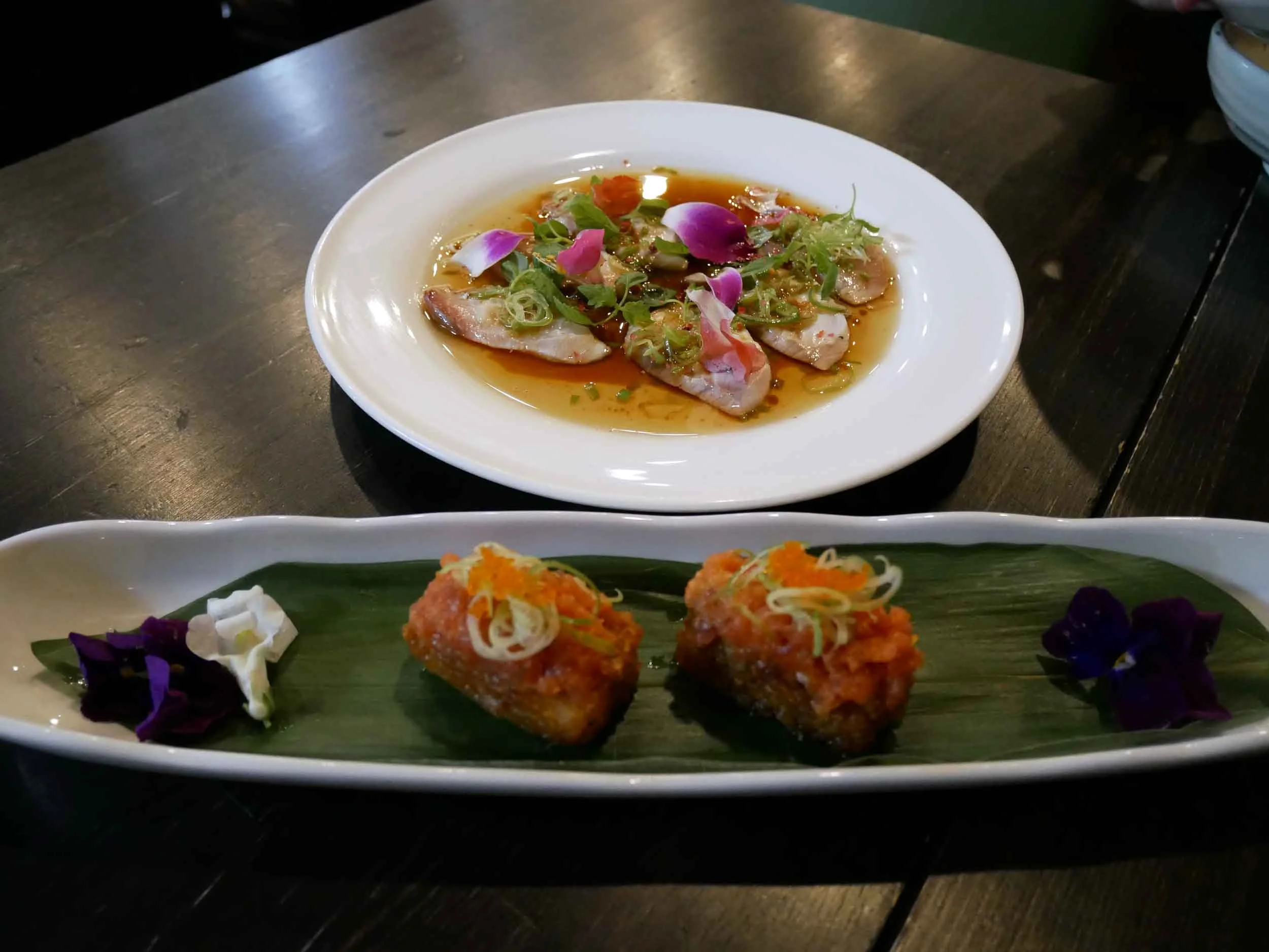  Spicy tuna crispy rice and yellow tail carpaccio. 