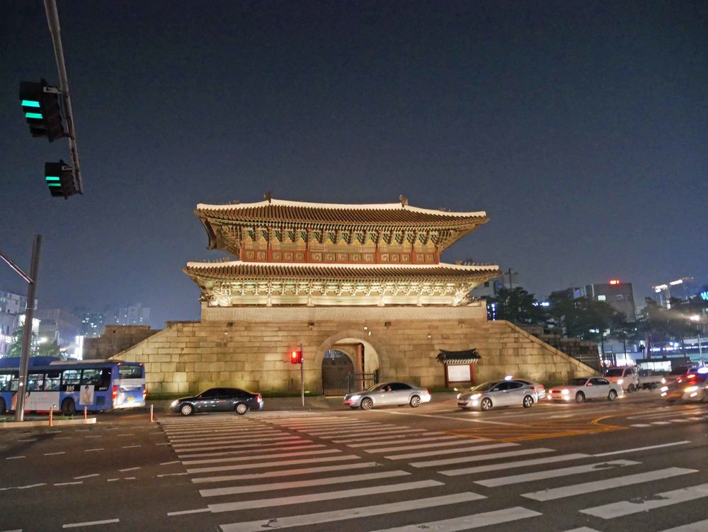  As we enjoyed the cooler summer evening air in Seoul, we passed Hyehwamun Gate, one of eight old fortress wall gates to the city.&nbsp; 