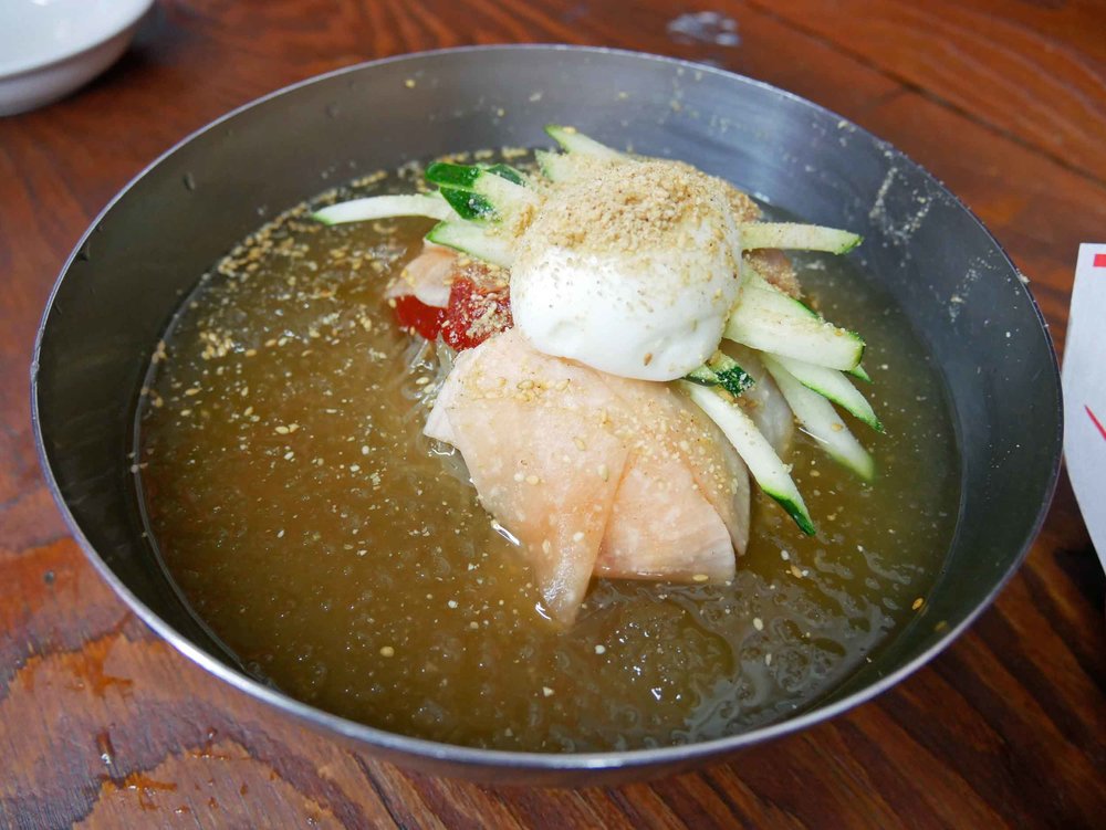  And Trey stuck to the more gluten-free option of  naengmyeon , or cold buckwheat noodles. 