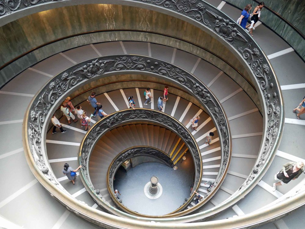  There was so much gilded beauty to behold at the Vatican museum, but we loved the simplicity of this spiral staircase.&nbsp; 
