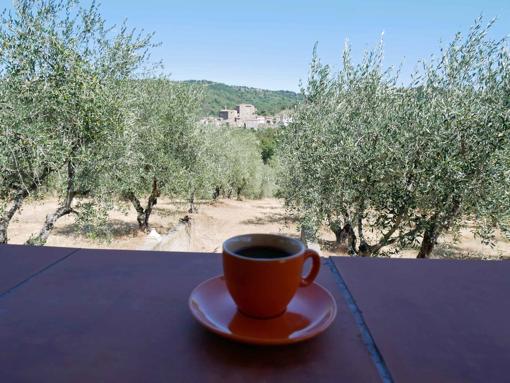  Italian espresso, a shaded terrace, and a charming setting away from it all--heaven! 