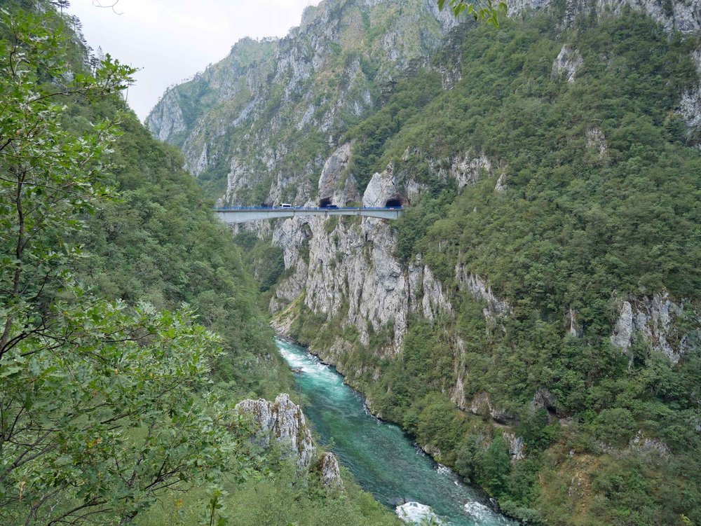  As we made our way to Plužine, the roads became more narrow and un-guarded, hanging on to the cliffs high above the Piva River below.&nbsp; 