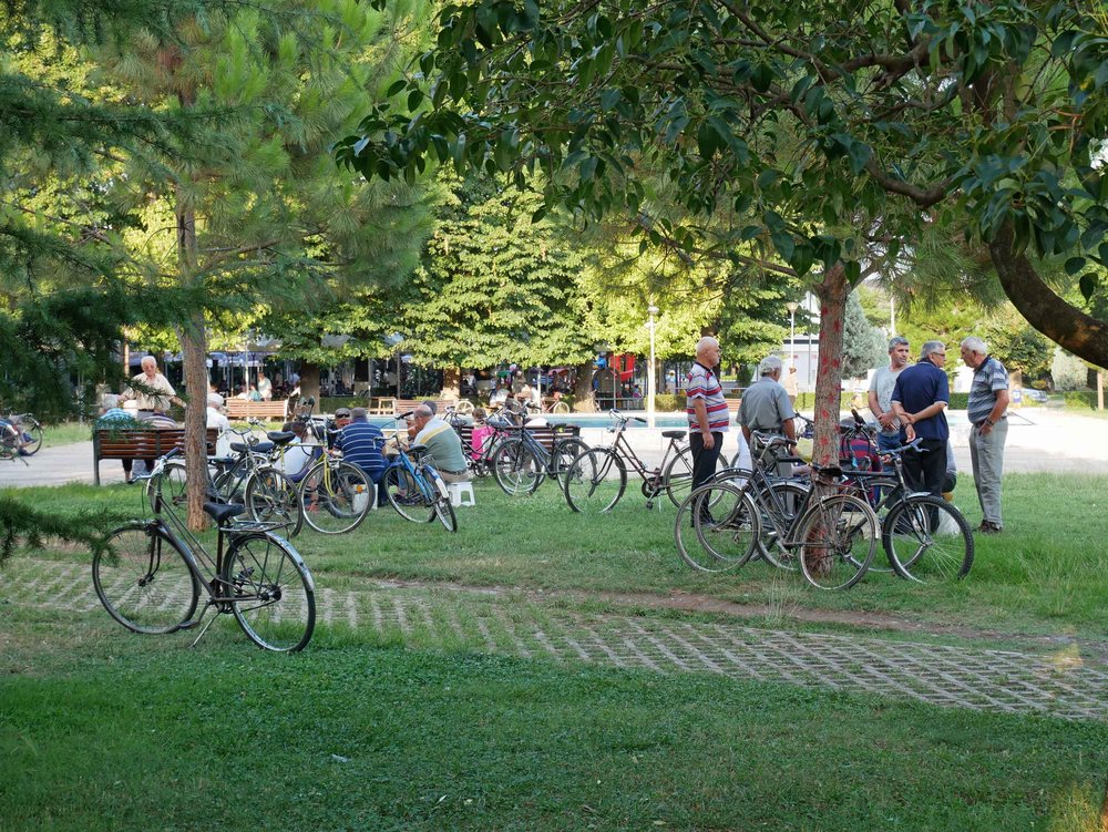  Like cities and towns everywhere, old men gathered on the green to play cards and dominoes.&nbsp; 