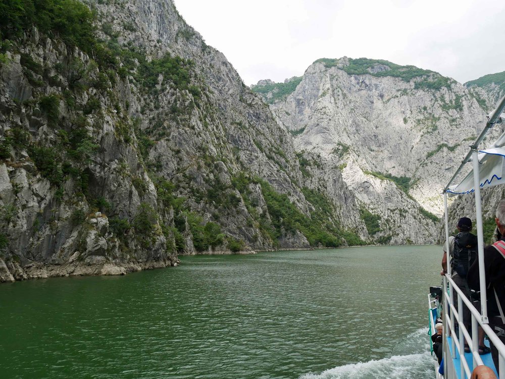  The next day, we took a ferry up the Koman Reservoir, which is surrounded by near vertical canyon walls, toward the village of Valbona where we would begin our trek (Aug 14).&nbsp; 