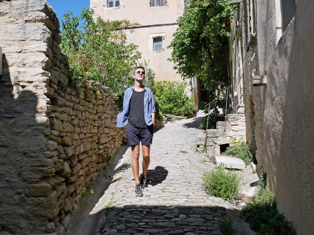  Trey strolling the cobbled streets near the perimeter of the old town’s medieval wall. 