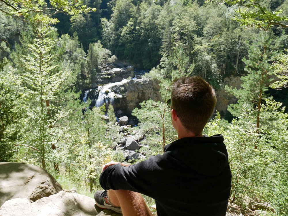  Trey enjoys the view of one of the three waterfalls we discovered during our ‘three waterfalls’ hike along the Rio Arazas at the base of Ordesa canyon. 