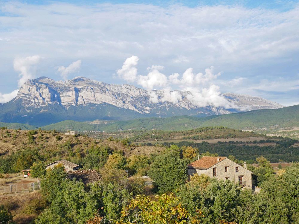  A few kilometres to the north, a great snow-streaked crag (known as the Peña Montañesa) towers high above the village, creating a spectacular backdrop (Sept 22). 