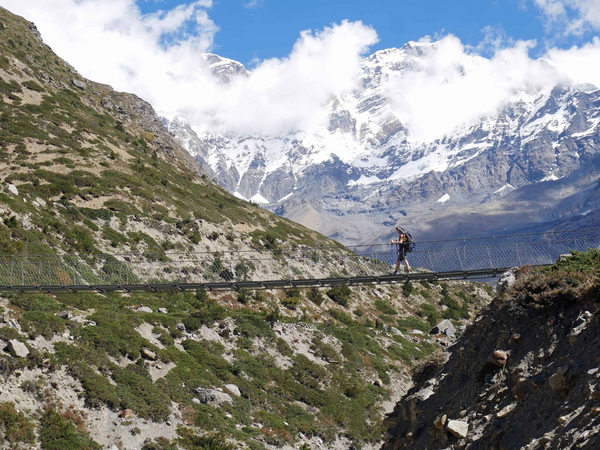  Trey leads the way over yet another suspension bridge. 