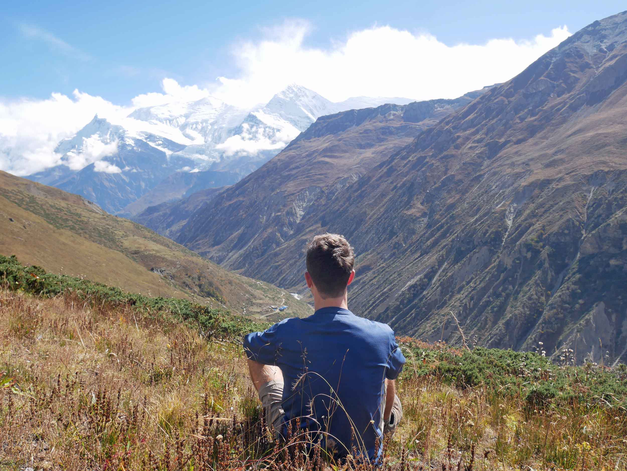 Martin taking a moment to appreciate the beauty of the range above Yak Kharka - and a hike without the pack!