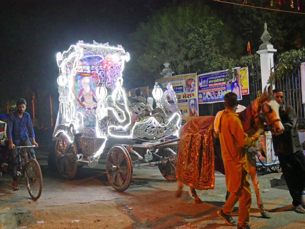  Our first evening in Amritsar, we stumbled upon a flashy, technicolor parade honoring the holy (Oct 30). 