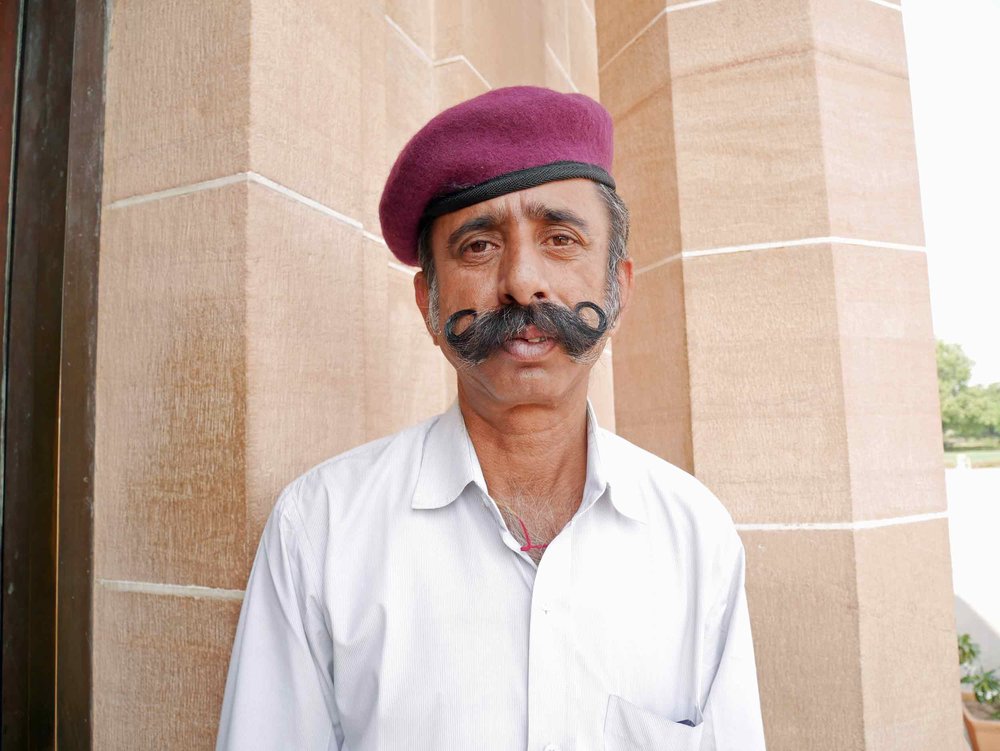  A guard at the Umaid Bhawan Palace in Jodhpur is sporting the facial hair style du jour . 