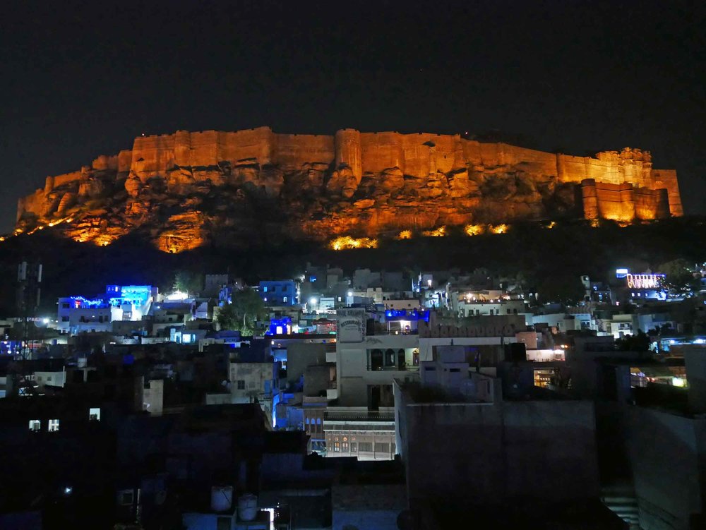  Seemingly carved out of the craggy hillside, the impressive view of Mehrangarh Fort from our guesthouse rooftop was breathtaking (Nov 12). 
