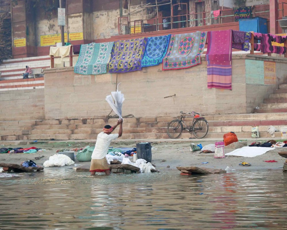  It’s not all holy worship and ritual at the river – here, clothing is being washed in earnest. 